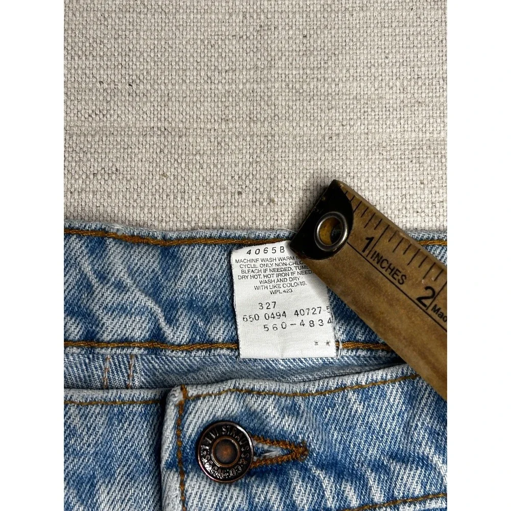 Vintage Levi's 560 Jeans Men's 38x30 Loose Fit Tapered Leg Light Wash USA